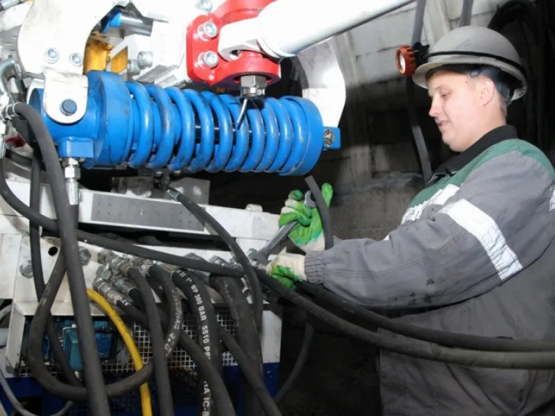 picture of miner working on becker equipment