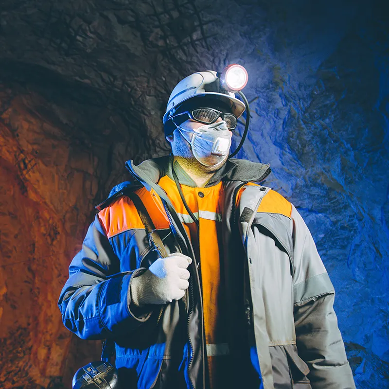 Picture of miner wearing smartsense and safety gear
